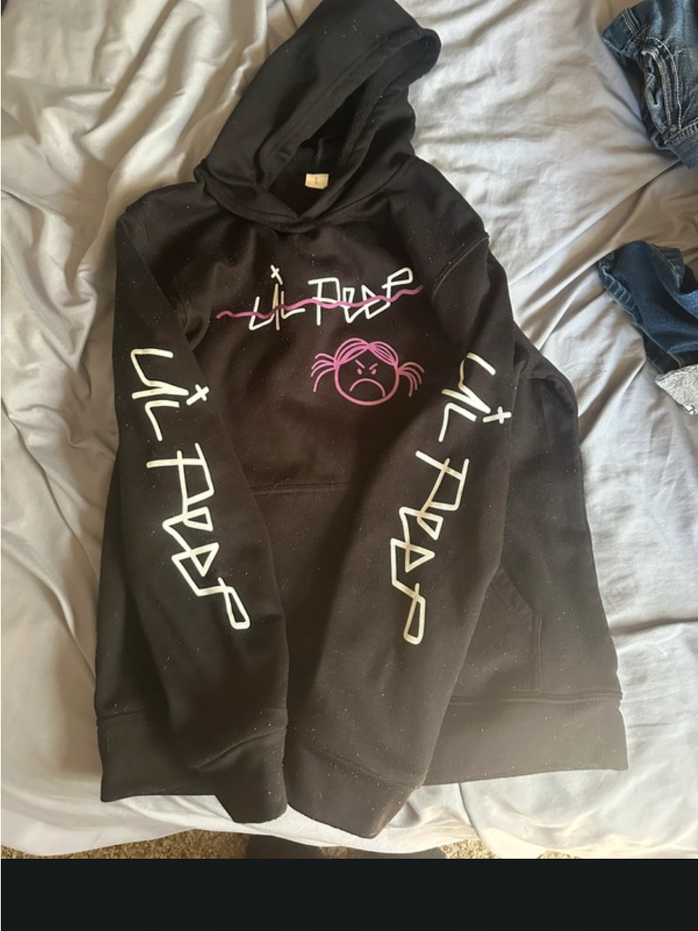 Black Graphic Hoodie with Pink Accent and White Sleeve Script